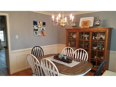 Dining room with crown, chair and picture moldings