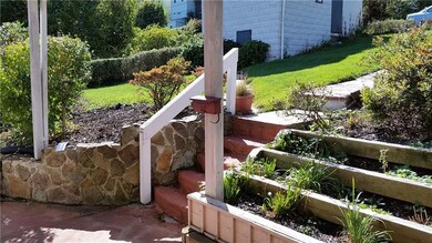 This back porch area greets you as you come in fro