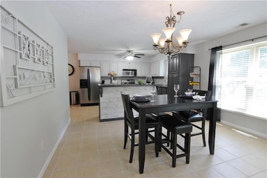 Right off the Great Rm - is the sunlit breakfast area