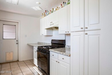 Kitchen with white cabinets