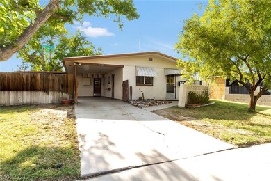 Photo showing the gate to carport open