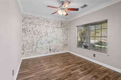 Study with barn door could also be a dining room or fourth bedroom