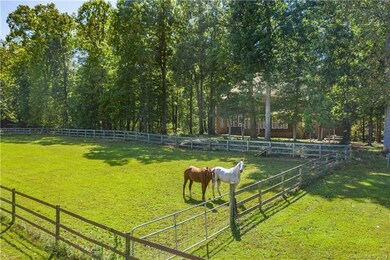 This beautiful equestrian estate has two pastures.