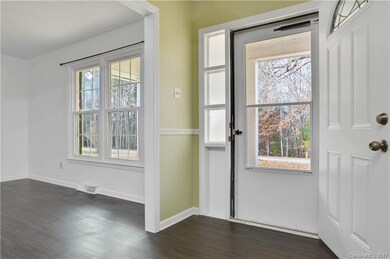 The Living Room is nicely separated from the entry