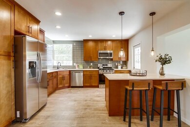 Bright & Open Kitchen with All New Stainless Appli