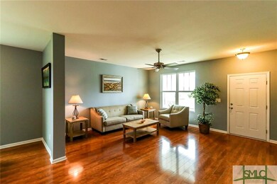 Large Living Room with Gorgeous Hardwood Flooring.