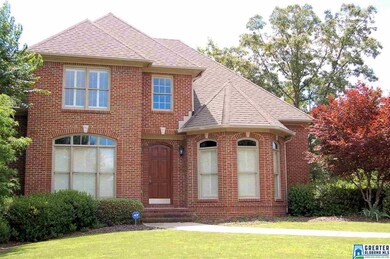 This 4 bedroom, 3 1/2 bath brick home is situated 