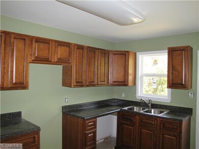 Kitchen. Stainless Steel built-in microwave and dishwasher to be installed.