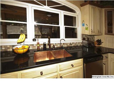 Copper sink in kitchen.