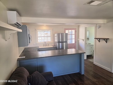 LIVING TO KITCHEN AND BATH
