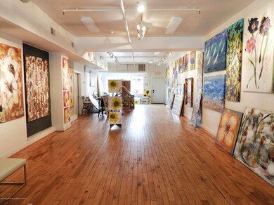 Retail space can be subdivided to offer 2 retail spaces. 1/2 bath on first floor and new central AC unit.