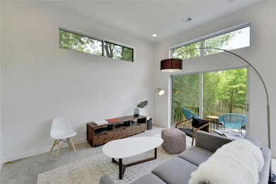 Living area featuring recessed lighting, plenty o