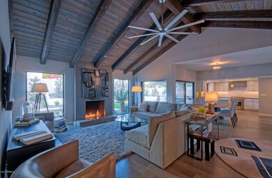 Great room surrounded by glass