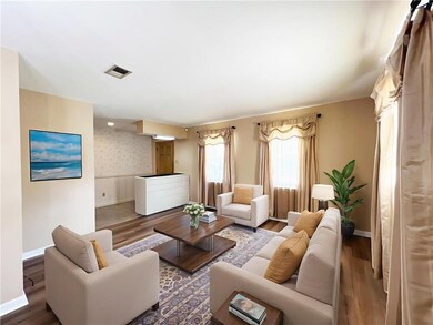 Living room is virtually staged.