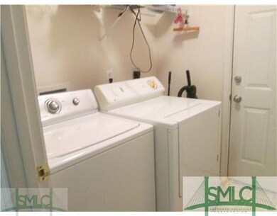 Laundry Room. Washer and dryer included in sale. T