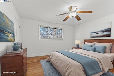 Upstairs bedroom that has be virtual staged
