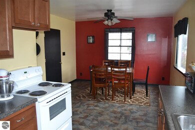 Bright and cheerful dining room is situated just o