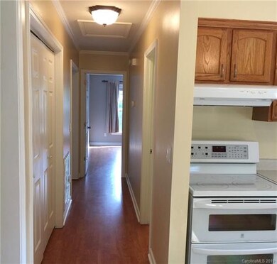 Looking down the hallway from the kitchen. Laundry
