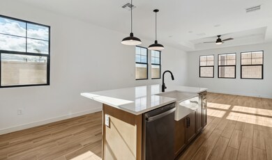 Kitchen with white apron-front sink