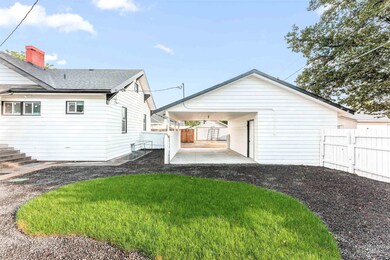 Rear view of house featuring a patio