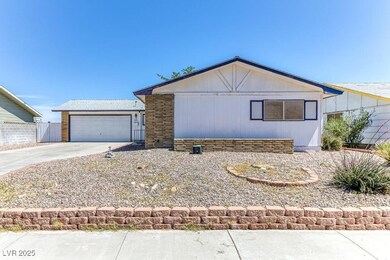 Ranch-style home featuring driveway, fence, and a