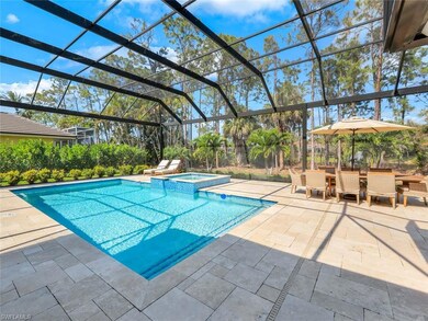 View of swimming pool with a lanai, a pool with co