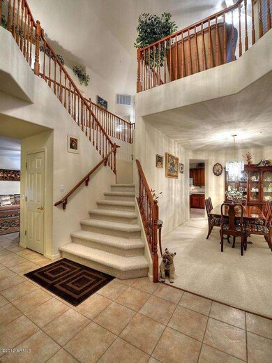Foyer-beautiful cherry railings