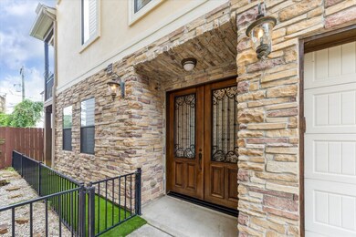 This photo showcases a charming home entrance feat