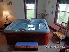 Unwind in your hot tub room