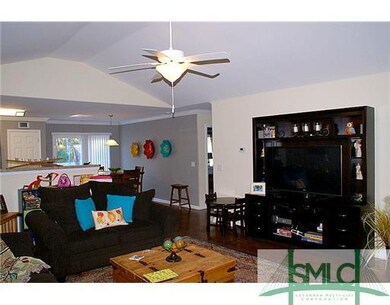 Den/Family/Great Room. It looks bright and brillia