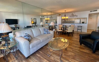 Living room with dark hardwood / wood-style floors