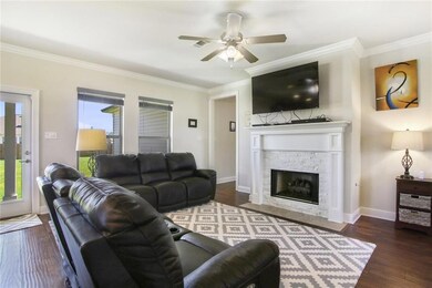 Living room with gas fireplace.