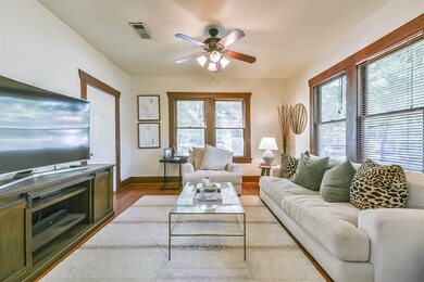 This formal living room has plenty of space for di