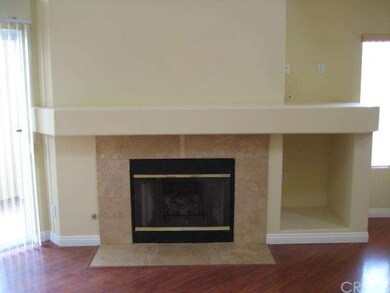 Fireplace with upgraded tile.