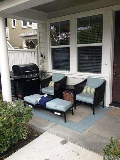 Front porch to relax and BBQ