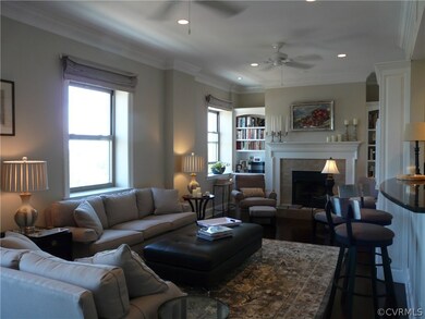 Living Area with Gas Fireplace flanked by Custom Built-ins.