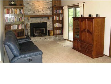 Main floor family room with wood burning fireplace