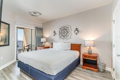 Bedroom with light hardwood / wood-style floors