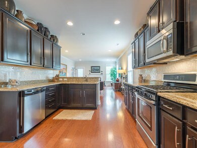 Kitchen open to Den
