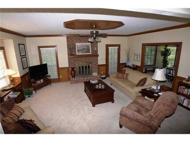 The 20 x 17 Family Room with  a fireplace with gas
