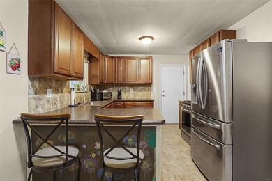 An ample amount of cabinets for storage.