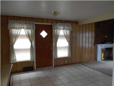 Back door in kitchen is open to LR.