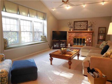 Family Room. Snuggle up to the fireplace, enjoy th
