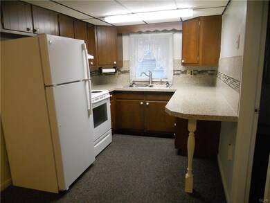 Modern kitchen with appliances and granite counters