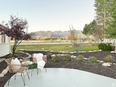 Front patio featuring a mountain view