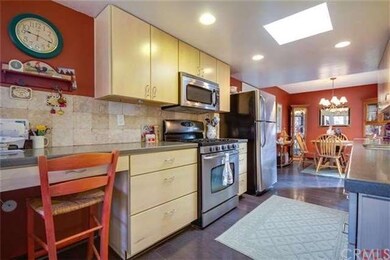 Remodeled kitchen with Corian counters and Kitchen