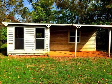 Storage shed on concrete slab