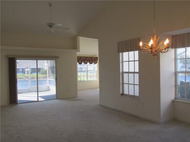 Combined Living/Dining Rooms Exit to Screened Porc