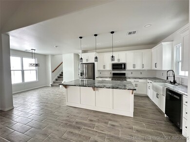Granite countertops, Appliances Included; Refriger