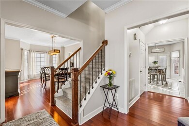 Light and airy entry with updated freshly painted walls, wood floors and 9ft ceilings offering the perfect flow.